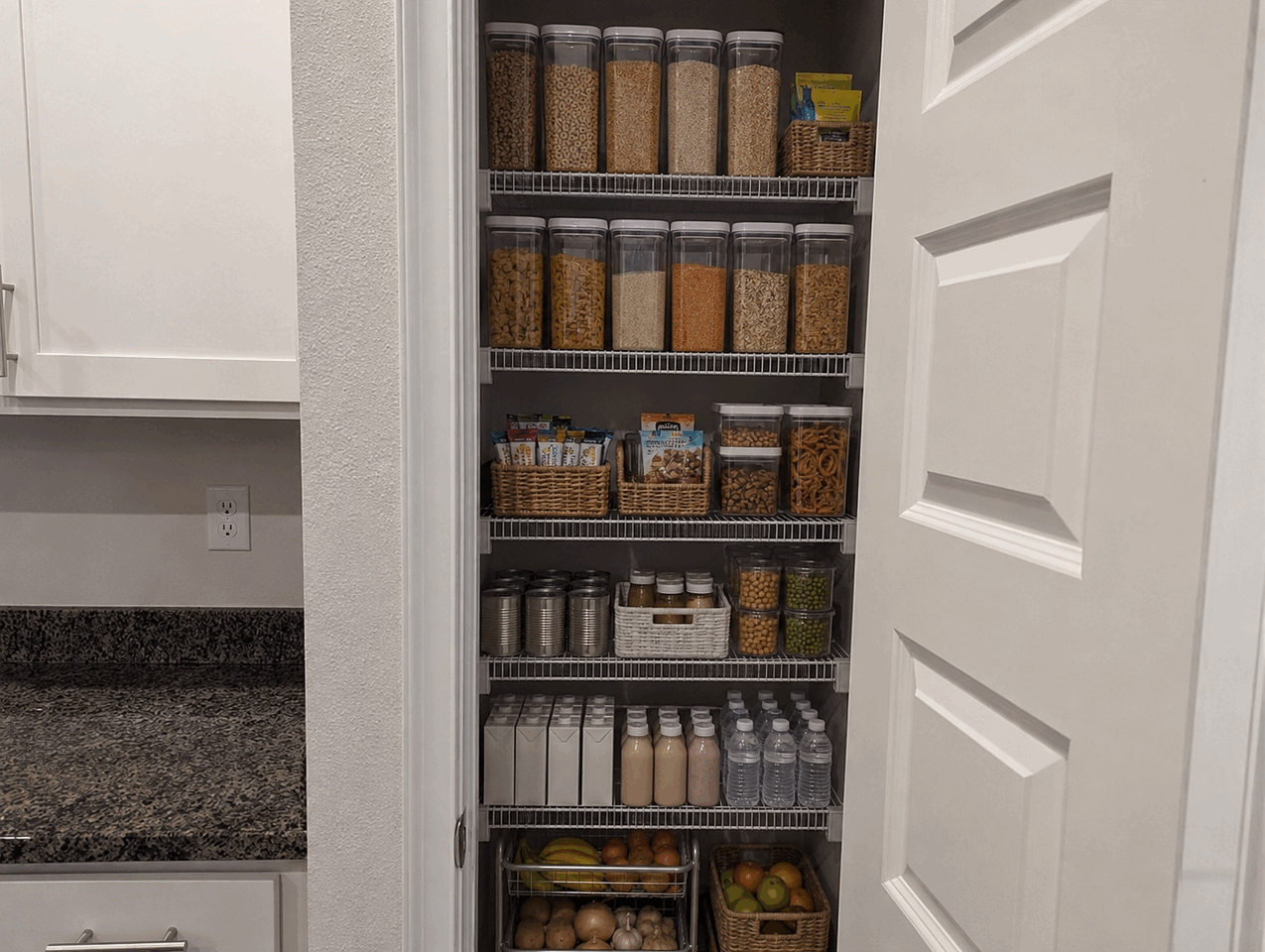 Well-stocked organized pantry with food and hydration supplies